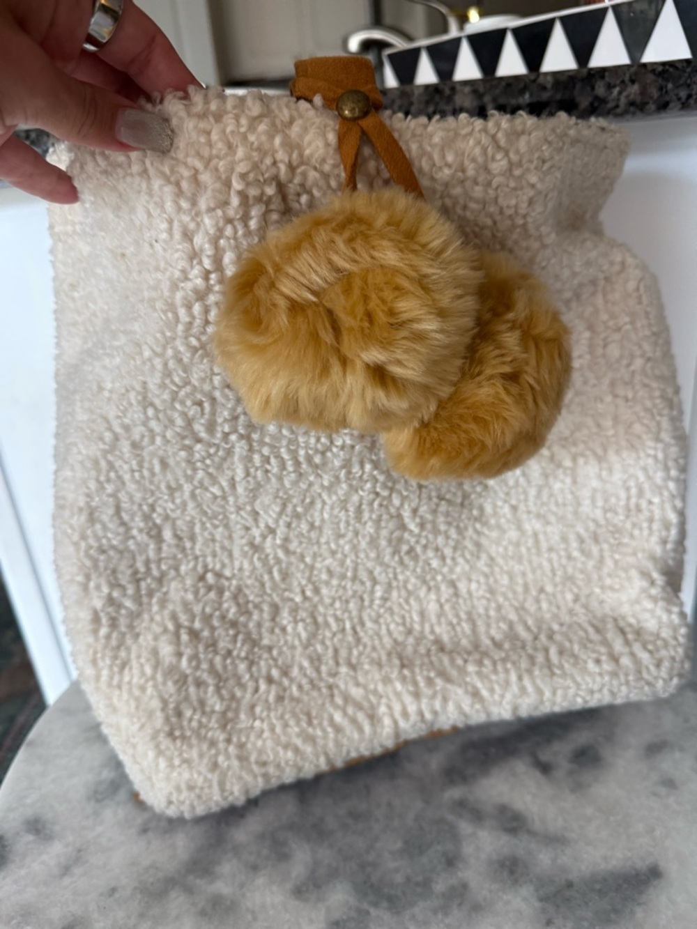 Cream Sherpa Drawstring Bag with Mustard Pom Poms